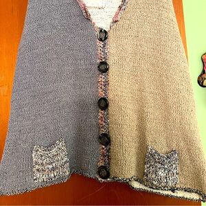 Artisan style knit vest with beautiful buttons. Vintage and hand loomed